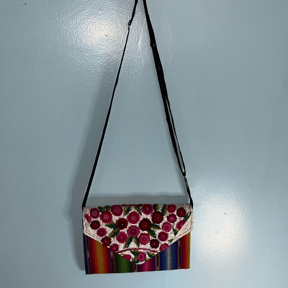 Mexico Artesanal purse. Used once in good condition. Adjustable strap. Colorful!